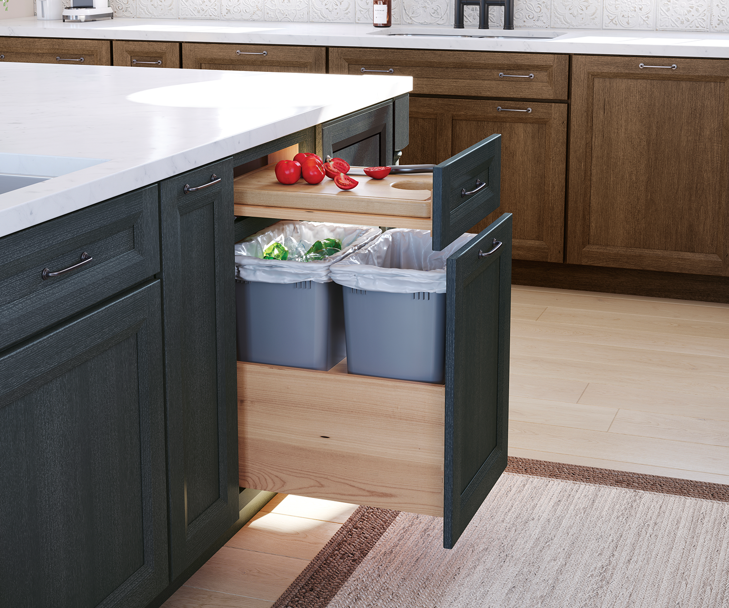 An image of a kitchen showcasing a sink, a drawer with a trash can, and practical integrated chopping block.